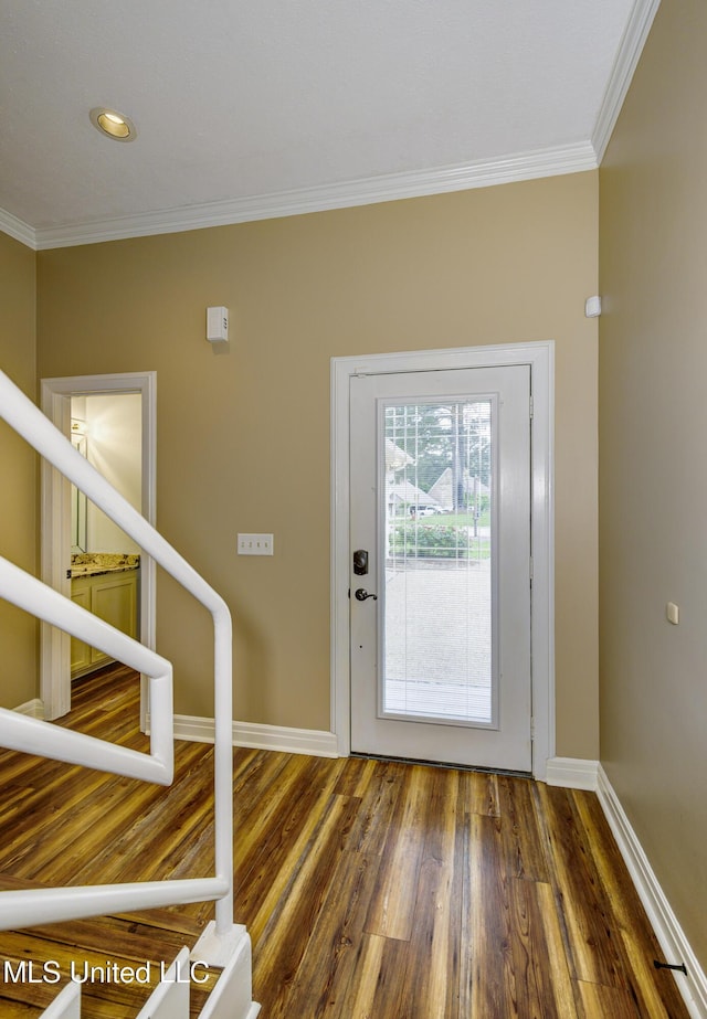 3099 E Fairway Dr, Brandon, MS 39047 - foyer entrance with crown molding, wood finished floors, and baseboards