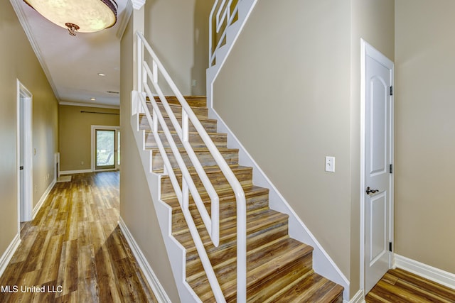 3099 E Fairway Dr, Brandon, MS 39047 - stairway with wood finished floors, ornamental molding, baseboards, and recessed lighting