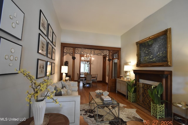101 E E President, Greenwood, MS 38930 - living room with a chandelier and wood finished floors