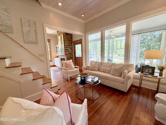 101 E E President, Greenwood, MS 38930 - living room with healthy amount of natural light, hardwood / wood-style flooring, crown molding, stairway, and recessed lighting