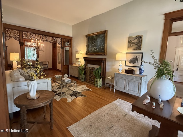 101 E E President, Greenwood, MS 38930 - living room featuring a chandelier and wood finished floors