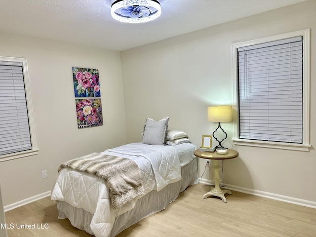 1529 Ticonderoga Dr, Southaven, MS 38671 - bedroom featuring wood finished floors and baseboards