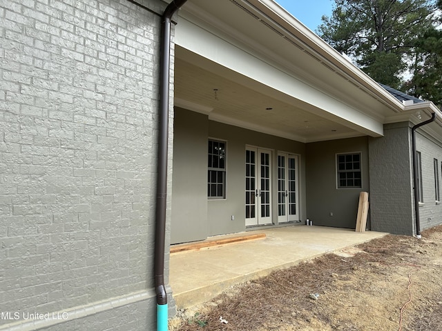 24 Waterstone Pl, Jackson, MS 39211 - back of house with a patio area, french doors, and brick siding