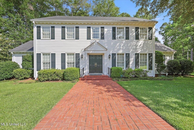 350 Whitfield Rd, Brandon, MS 39042 - colonial house featuring a front lawn