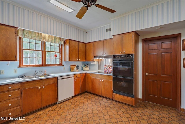 350 Whitfield Rd, Brandon, MS 39042 - kitchen with black appliances, brown cabinets, light flooring, and ornamental molding