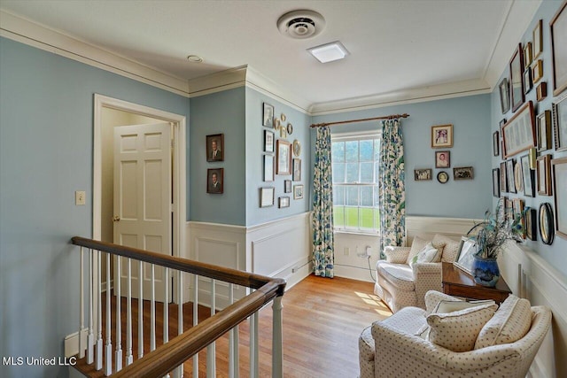 350 Whitfield Rd, Brandon, MS 39042 - sitting room featuring ornamental molding, light wood-style flooring, a wainscoted wall, and a decorative wall