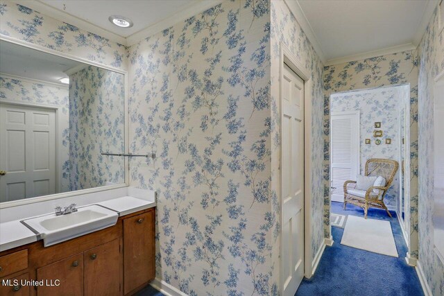350 Whitfield Rd, Brandon, MS 39042 - bathroom featuring ornamental molding, vanity, and wallpapered walls