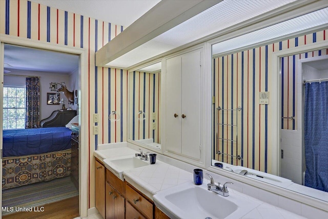 350 Whitfield Rd, Brandon, MS 39042 - full bath with wallpapered walls and double vanity