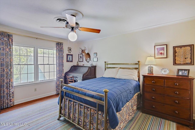 350 Whitfield Rd, Brandon, MS 39042 - bedroom with wood finished floors, crown molding, and a ceiling fan