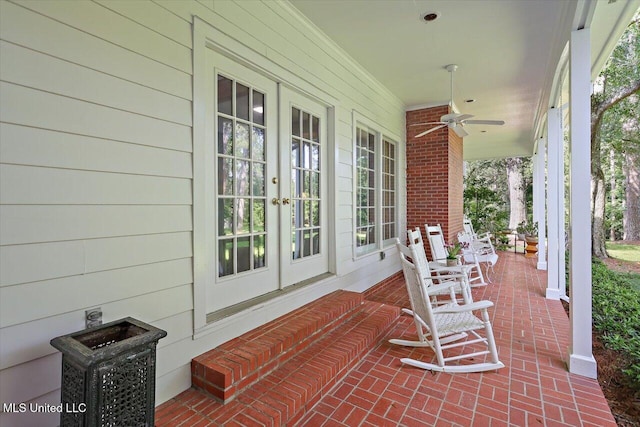 350 Whitfield Rd, Brandon, MS 39042 - covered porch with french doors and a ceiling fan