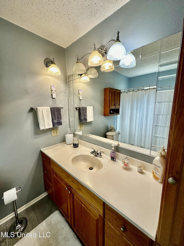 bathroom featuring tile patterned flooring, a textured ceiling, toilet, vanity, and a shower with shower curtain