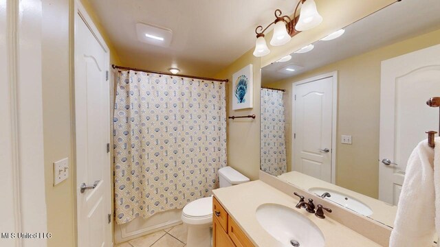 1200 Beach Dr Unit 806, Gulfport, MS 39507 - bathroom with tile patterned flooring, toilet, and vanity