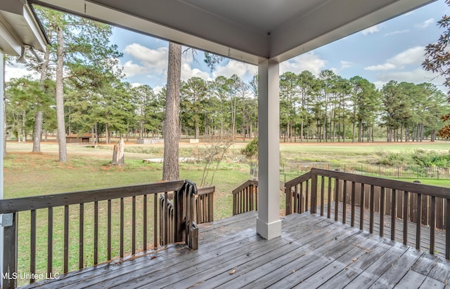 deck featuring a lawn