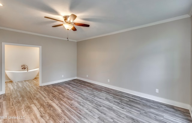 unfurnished room featuring ceiling fan, hardwood / wood-style flooring, and ornamental molding