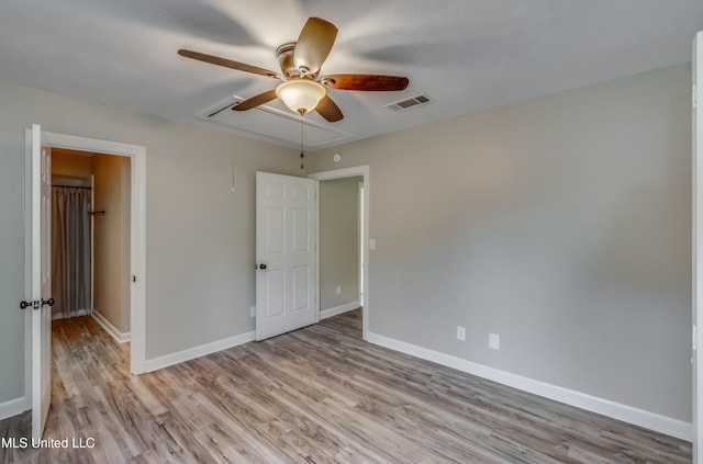 unfurnished bedroom with light wood-type flooring and ceiling fan