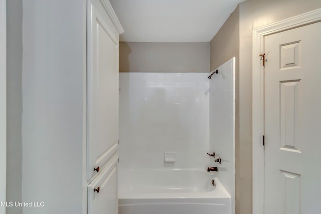 bathroom featuring  shower combination