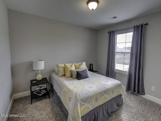 bedroom featuring carpet