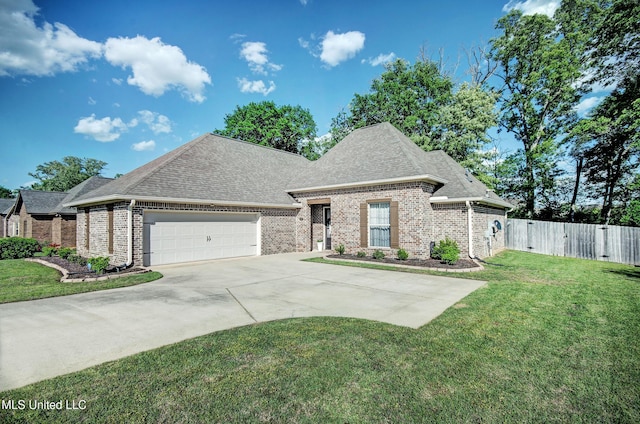 236 Cooper Ln, Canton, MS 39046 - view of front of property with a garage, a front yard, fence, and brick siding