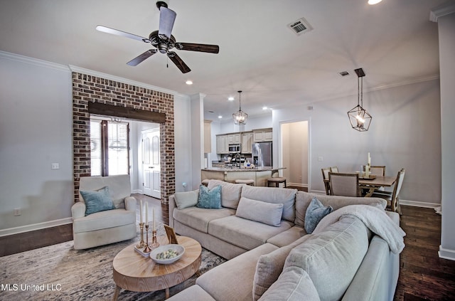 236 Cooper Ln, Canton, MS 39046 - living area featuring ceiling fan, dark wood-type flooring, ornamental molding, visible vents, and baseboards