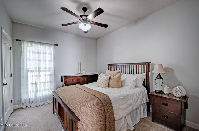 236 Cooper Ln, Canton, MS 39046 - bedroom featuring baseboards, a ceiling fan, and carpet floors