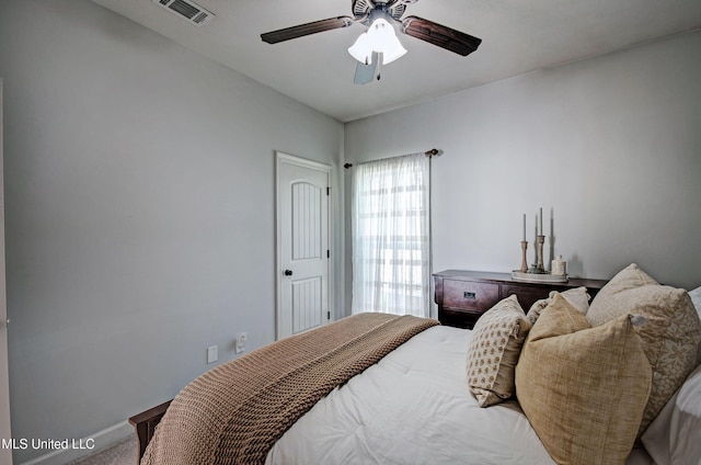 236 Cooper Ln, Canton, MS 39046 - bedroom with a ceiling fan, baseboards, carpet, and visible vents
