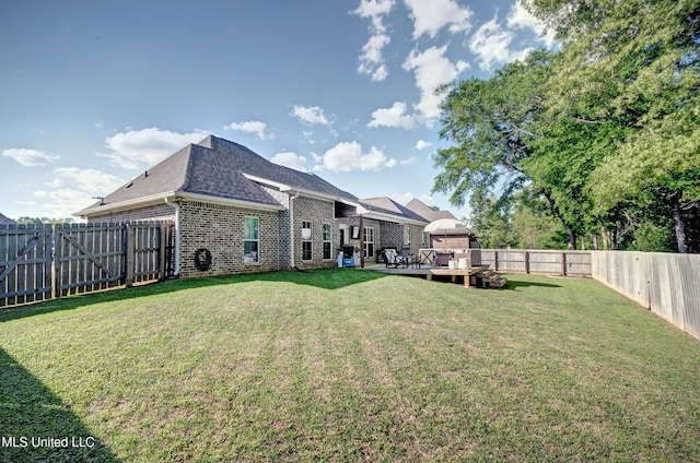 236 Cooper Ln, Canton, MS 39046 - view of yard featuring a fenced backyard and a wooden deck
