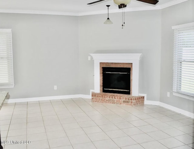 unfurnished living room featuring a fireplace, light tile patterned floors, and crown molding