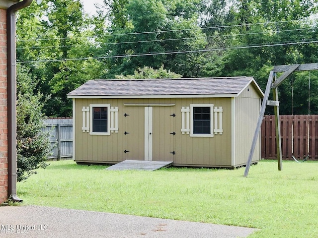 view of outdoor structure featuring a yard