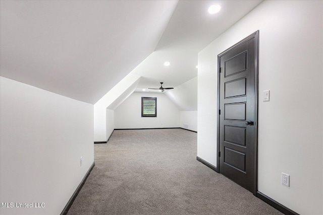 bonus room featuring baseboards, carpet flooring, vaulted ceiling, and recessed lighting