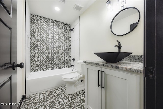 bathroom with visible vents, vanity, toilet, recessed lighting, and shower / washtub combination