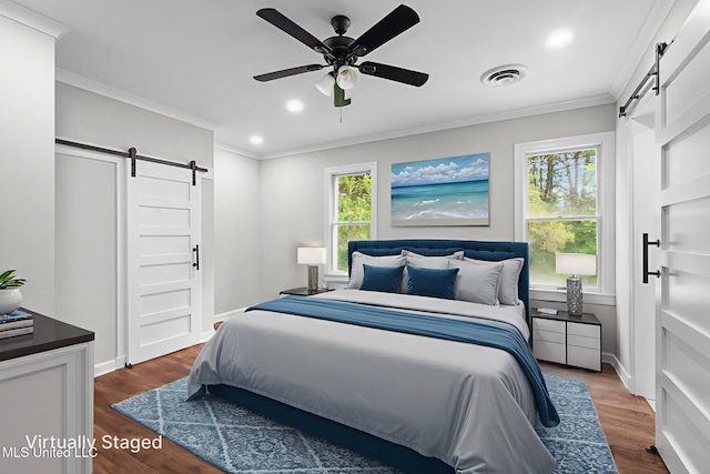 112 Louis Wilson Dr, Brandon, MS 39042 - bedroom featuring a barn door, crown molding, dark wood-style flooring, recessed lighting, and a ceiling fan