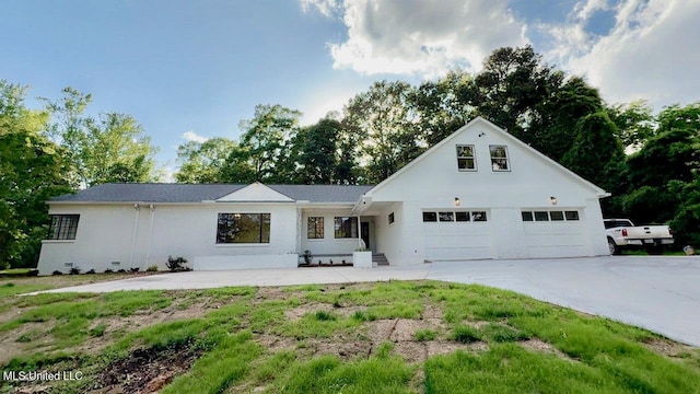 112 Louis Wilson Dr, Brandon, MS 39042 - view of front of property featuring a garage and concrete driveway