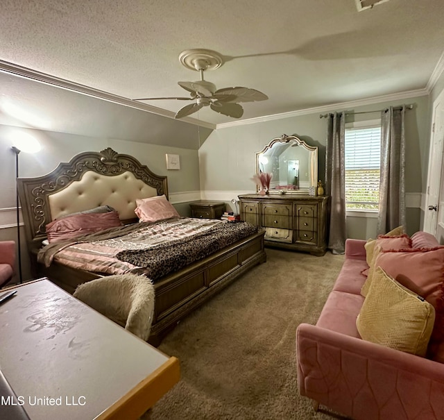 bedroom featuring crown molding, carpet floors, a textured ceiling, and ceiling fan