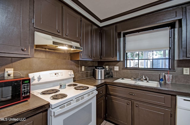 100 Eager St Unit C, Clinton, MS 39056 - kitchen with white appliances, under cabinet range hood, and dark brown cabinetry