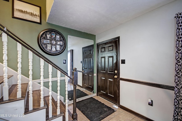 100 Eager St Unit C, Clinton, MS 39056 - foyer entrance with stairway and tile patterned flooring