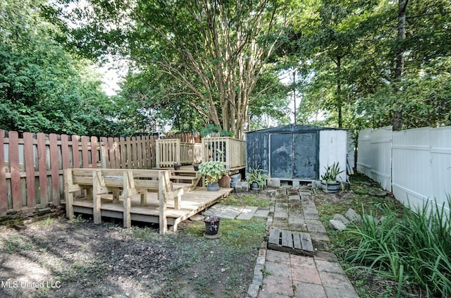 100 Eager St Unit C, Clinton, MS 39056 - fenced backyard featuring a shed and a wooden deck