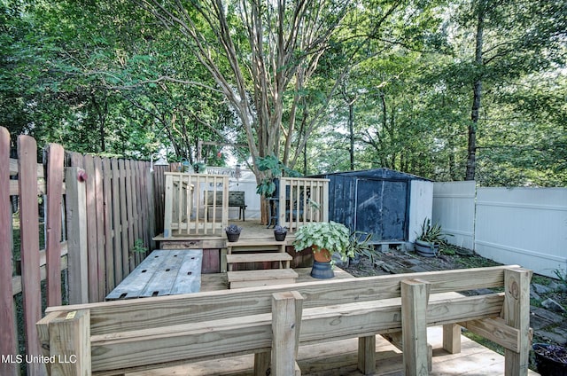 100 Eager St Unit C, Clinton, MS 39056 - deck with a storage unit and a fenced backyard