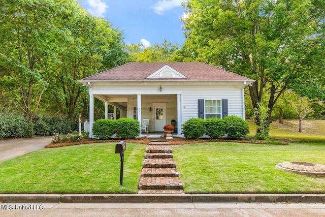 bungalow-style house with a front lawn and a porch
