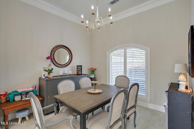 230 Lighthouse Ln, Brandon, MS 39047 - dining space with a chandelier, crown molding, light wood-type flooring, and a high ceiling