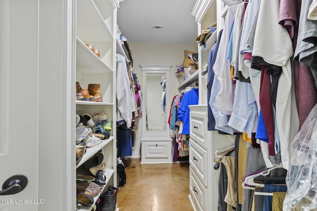 spacious closet featuring visible vents