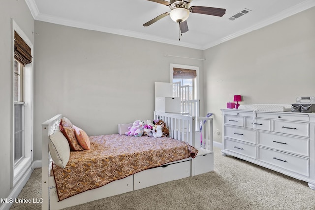 bedroom featuring light carpet, ornamental molding, visible vents, and baseboards