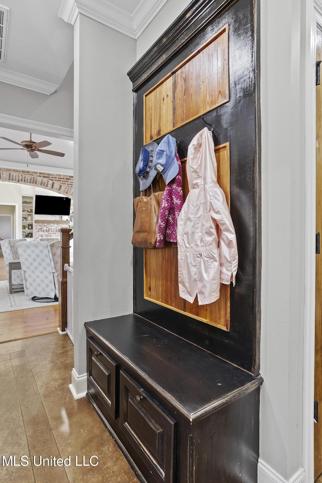 mudroom with baseboards, ceiling fan, tile patterned flooring, and crown molding