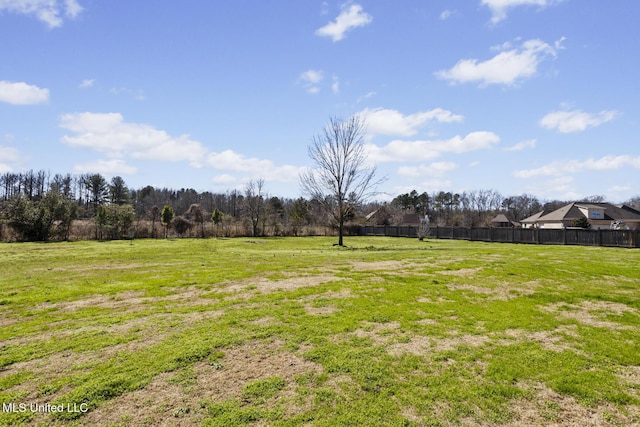 view of yard featuring fence