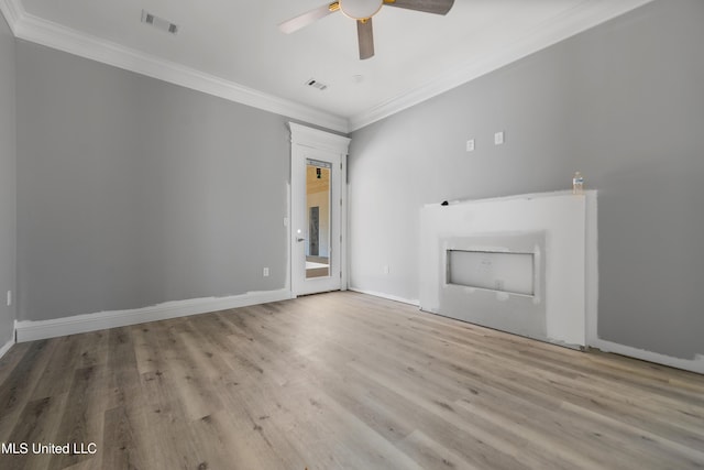 unfurnished room featuring crown molding, light hardwood / wood-style flooring, and ceiling fan