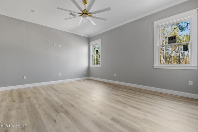 empty room with crown molding, ceiling fan, and light wood-type flooring