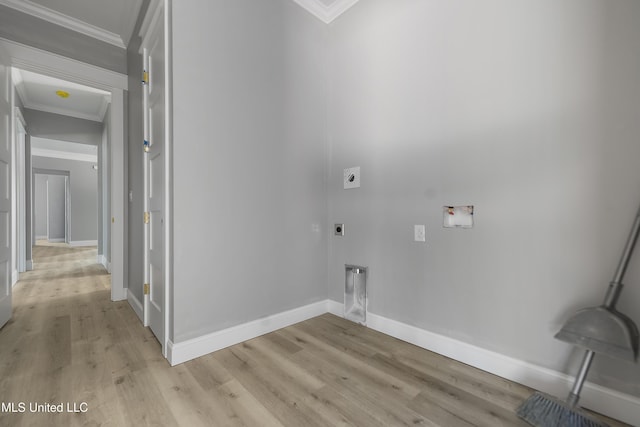 laundry area with ornamental molding, washer hookup, hookup for an electric dryer, and light wood-type flooring