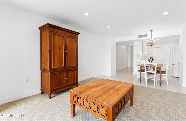 living room featuring a chandelier