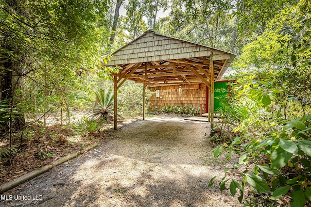 view of patio / terrace featuring a carport
