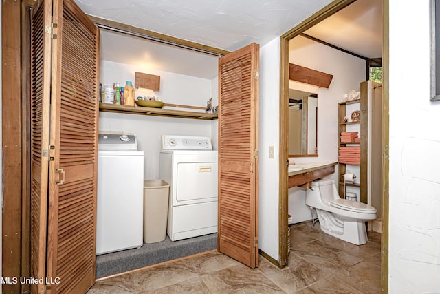 laundry room with washer and dryer and laundry area