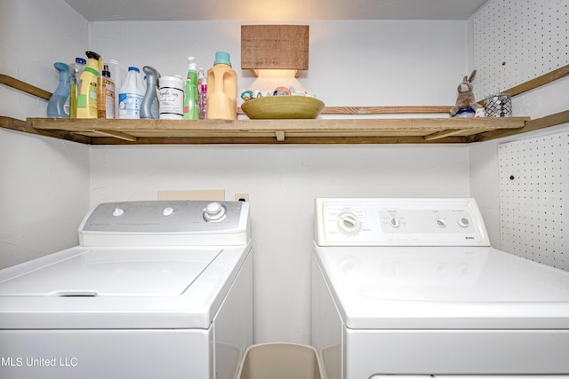 laundry room featuring laundry area and washer and clothes dryer